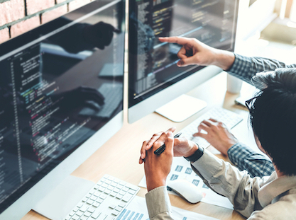 An introduction to Cisco AppDynamics; people at desktop